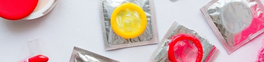 Condoms placed on the white table to prevent STD